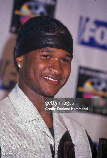 American pop and r&b musician Usher attends the 5th Annual Blockbuster Entertainment Awards ceremony at the Shrine Auditorium, Los Angeles,...