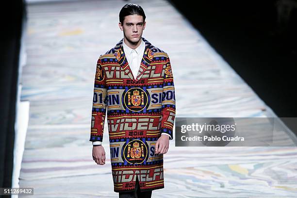 Model walks the runway at the David Delfin show during the Mercedes-Benz Madrid Fashion Week Autumn/Winter 2016/2017 at Ifema on February 19, 2016 in...