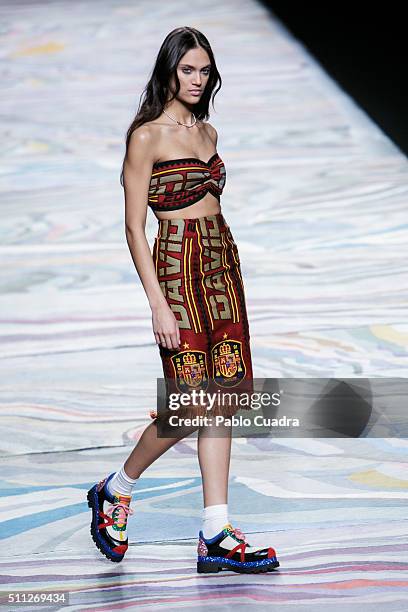 Model walks the runway at the David Delfin show during the Mercedes-Benz Madrid Fashion Week Autumn/Winter 2016/2017 at Ifema on February 19, 2016 in...