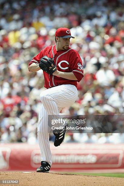 Pitcher Aaron Harang of the Cincinnati Reds winds up to deliver the ball during MLB game against the Cleveland Indians at Great American Ball Park on...