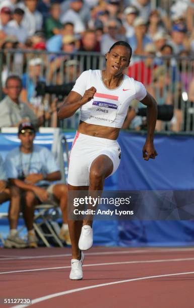 Marion Jones of Nike competes in the 200 Meter Dash during the U.S. Olympic Team Track & Field Trials on July 16, 2004 at the Alex G. Spanos Sports...