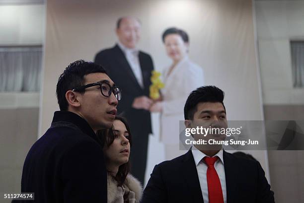 Kim Bok-Kyun from South Korea attends the orientation with his bride Alison Malbch from the United States the day before taking part in a mass...