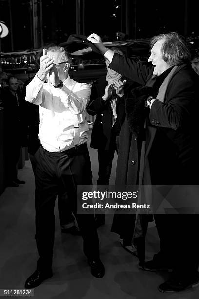 Dieter Kosslick and actor Gerard Depardieu joke around prior the 'Saint Amour' premiere during the 66th Berlinale International Film Festival Berlin...