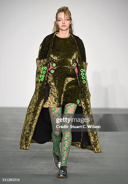 Model walks the runway at the Fyodor Golan show during London Fashion Week Autumn/Winter 2016/17 at Brewer Street Car Park on February 19, 2016 in...