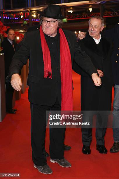Actor Gerard Depardieu, wearing Dieter Kosslick's scarf, glasses and hat, attends the 'Saint Amour' premiere during the 66th Berlinale International...