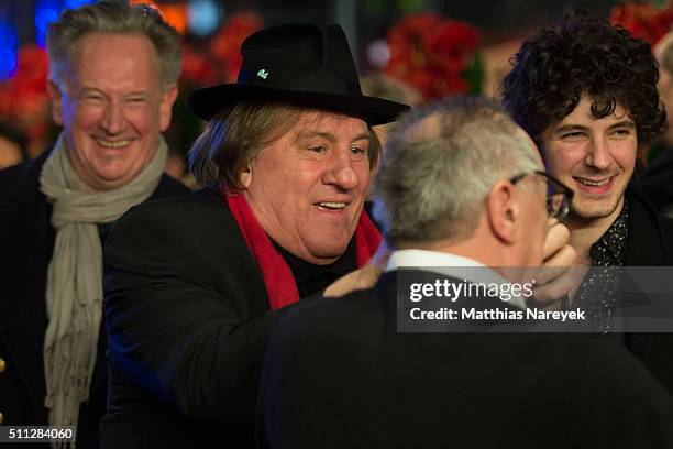 Gerard Depardieu, wearing Dieter Kosslick's scarf and hat, also takes his glasses during the Amour' premiere during the 66th Berlinale International...