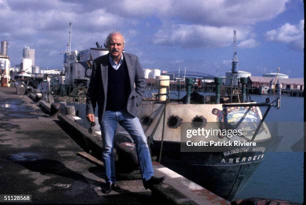 In front of the Greenpeace boat Rainbow Warrior.