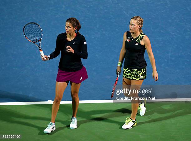 Timea Babos of Hungary and Julia Goerges of Germany in action against Caroline Garcia of France and Kristina Mladenovic of France during their...