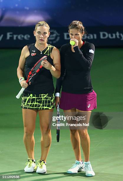 Timea Babos of Hungary and Julia Goerges of Germany in action against Caroline Garcia of France and Kristina Mladenovic of France during their...