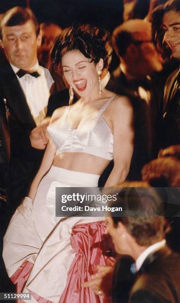 Actress Madonna arrives for the premiere of her film 'In Bed with Madonna' in 1991 at the Cannes Film Festival, France.