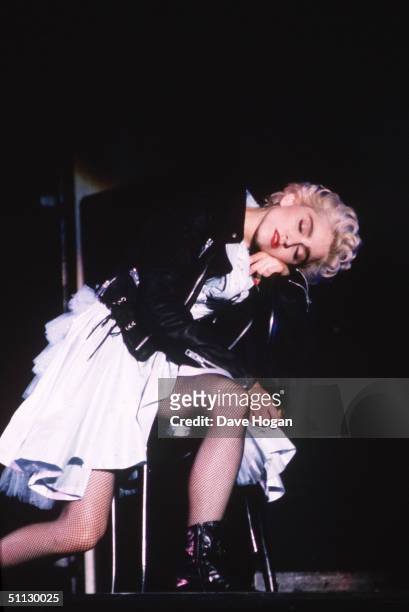 Singer Madonna performs on stage.