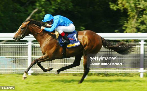Frankie Dettori and The Godolphin trained Ancient World lead the field home to land The William Hill Mile Race run at Goodwood Racecourse on July 30,...