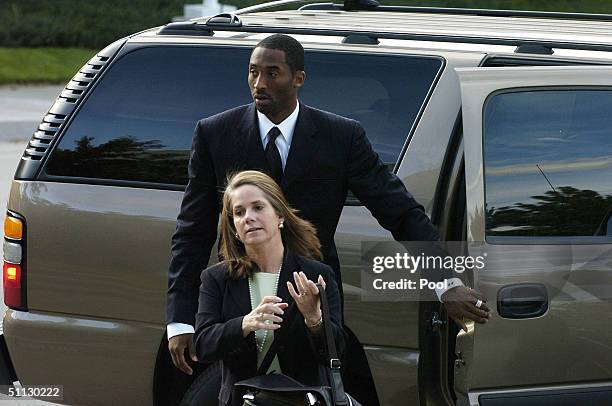 Los Angeles Lakers star Kobe Bryant and his attorney Pamela Mackey arrive at the Eagle County Justice Center for pre-trial hearings July 30, 2004 in...