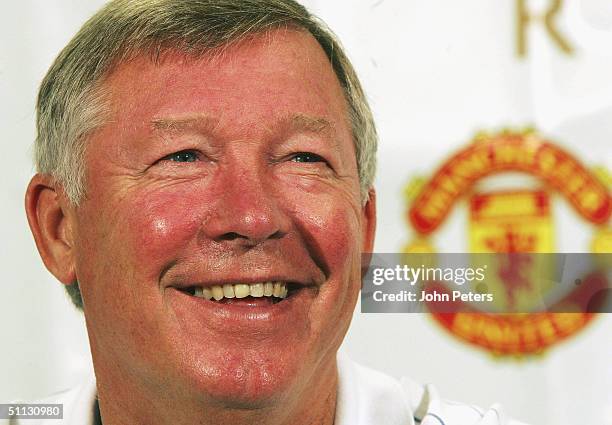 Sir Alex Ferguson of Manchester United smiles in a press conference after a training session during their 2004 USA Tour, which is taking in...