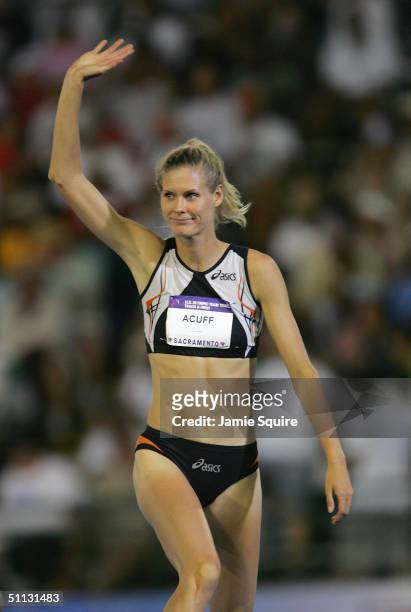 Amy Acuff of Asics waves to the fans after finishing third in the High Jump during the U.S. Olympic Team Track & Field Trials on July 12, 2004 at the...