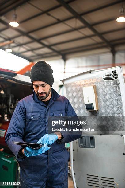 mechanic technician on a garage - plumber van stock pictures, royalty-free photos & images