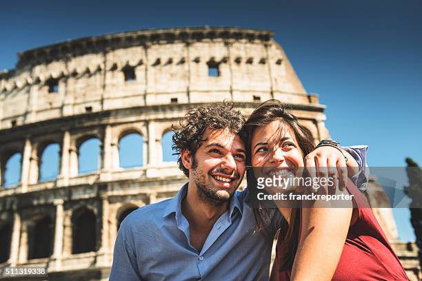 couple of tourist in rome enjoy the vacation - march for europe celebrates treaty of rome stockfoto's en -beelden