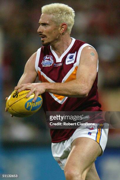 Jason Akermanis of the Lions in action during the round 18 AFL match between the Sydey Swans and the Brisbane Lions on July 31, 2004 at the Sydney...