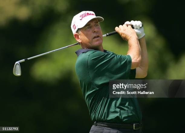 Jay Haas hits his tee shot on the third hole during the second round of the 25th U.S. Senior Open on July 31, 2004 at Bellerive Country Club in St....