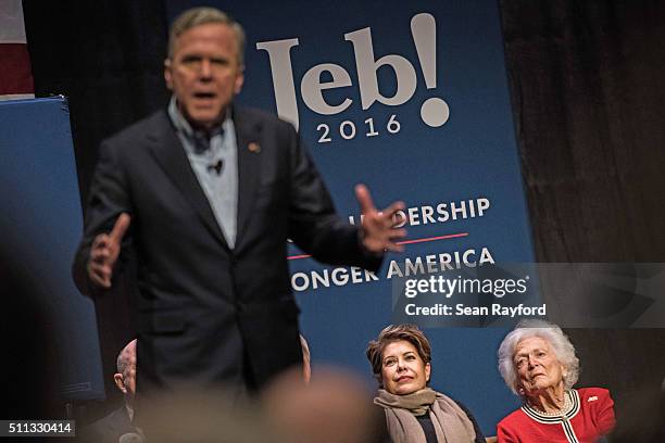 Jeb Bush's wife Columba Bush, left, and former first lady Mrs. Barbara Bush listen to Republican presidential candidate Jeb Bush at a campaign event...