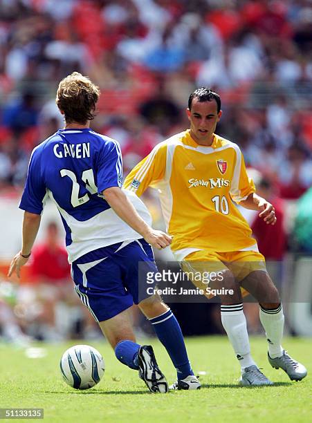 Landon Donovan of the West All-Stars controls the ball as Eddie Gaven of the East All-Stars defends during the Sierra Mist MLS All-Star Game at RFK...