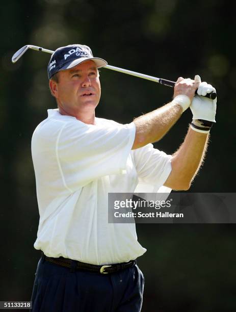 Weibring watches his tee shot on the third hole during the second round of the 25th U.S. Senior Open at Bellerive Country Club on July 31, 2004 in...