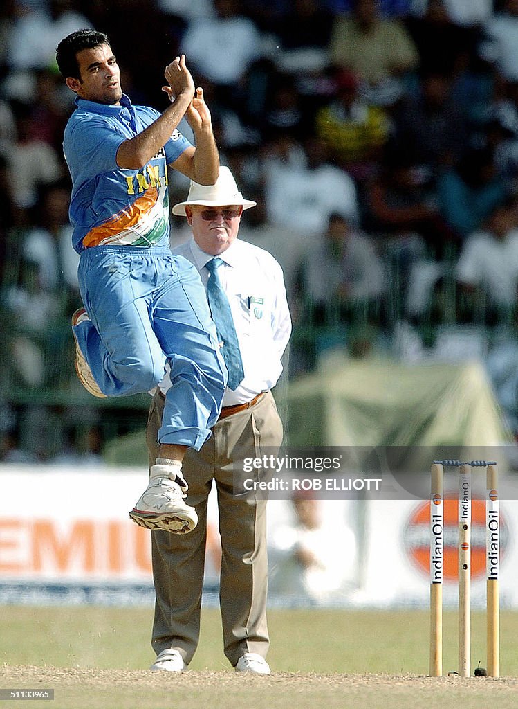 India bowler, Zaheer Khan (L) gets airbo