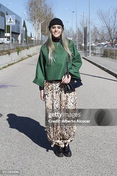 Isabel Garcia is wearing Zara Shoes, Mango Pants, Xavi Reyes Jersey and HM Hat at Mercedes-Benz Madrid Fashion Week Autumn/Winter 2016/2017 on...