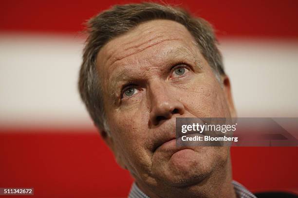 John Kasich, governor of Ohio and 2016 Republican presidential candidate, pauses as he speaks during a campaign event at the Patriots Point Naval &...