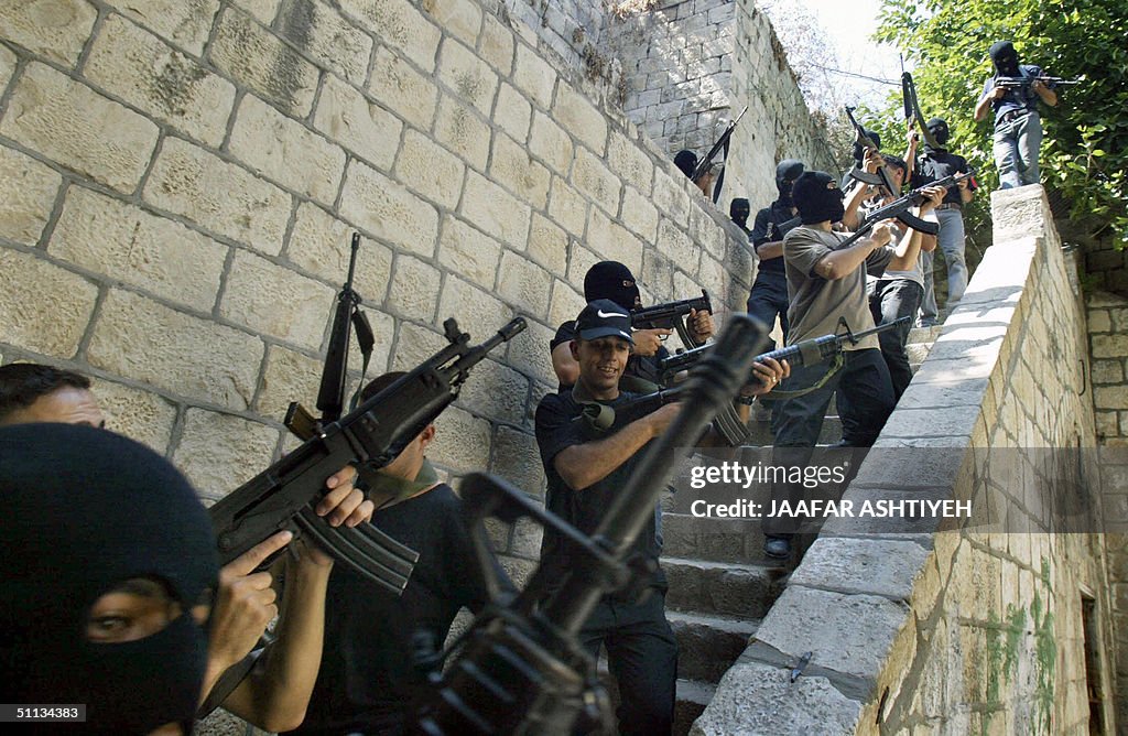 Militants from Al-Awda brigade, an armed