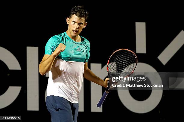 Dominic Theim of Austria celebrates a point against David Ferrer of Spain during the Rio Open at Jockey Club Brasileiro on February 19, 2016 in Rio...