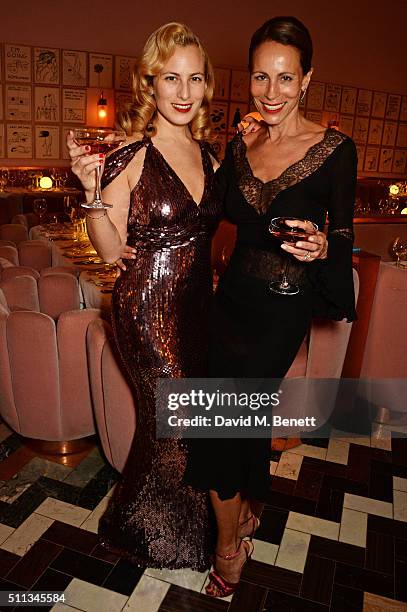 Charlotte Dellal and Andrea Dellal attend as James Gager, Senior Vice President & Group Creative Director of M.A.C Cosmetics, and Charlotte Olympia...