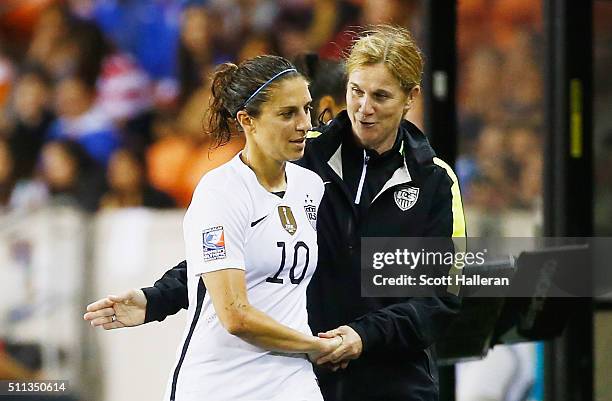 United States coach Jillian Ellis greets Carli Lloyd as she leaves the the game against Trinidad and Tobago during their Semifinal of the 2016...