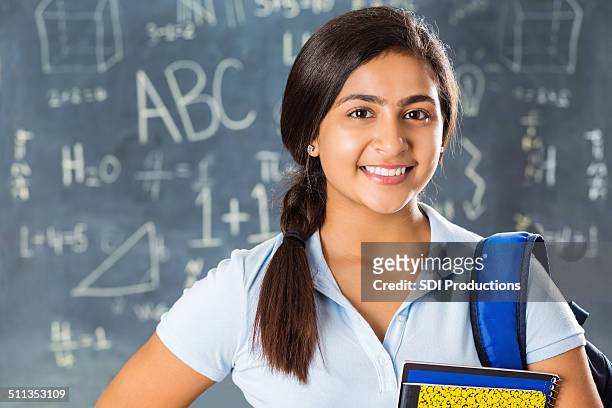 portrait of pretty indian high school student in classroom - school uniform stock pictures, royalty-free photos & images
