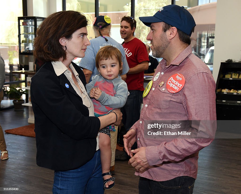 Actress Gaby Hoffmann holds her daughter Rosemary Dapkins as she
