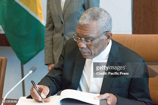 Guyanese President David Granger signs the Secretary-General's guestbook. Amid escalating tensions between the Republic of Guyana and Venezuela...