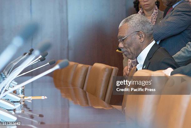 Guyanese President David Granger takes a seet at the Secretary-General's conference table. Amid escalating tensions between the Republic of Guyana...