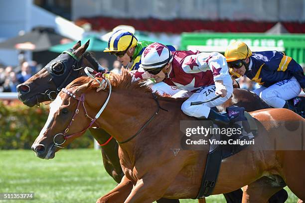 Mark Zahra riding Palentino defeats Craig Williams riding Tivaci but loses race on protest in Race 4, the CS Hayes Stakes during Black Caviar...