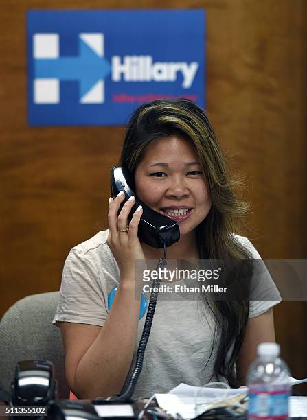Evelyn Gong of New York makes phone calls at a campaign office for Democratic presidential candidate Hillary Clinton on February 19, 2016 in Las...