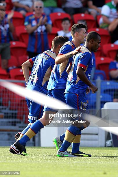 Jets players celebrate a goal during the round 20 A-League match between the Newcastle Jets and Wellington Phoenix at Hunter Stadium on February 20,...