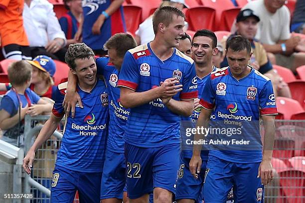 Jets players celebrate a goal during the round 20 A-League match between the Newcastle Jets and Wellington Phoenix at Hunter Stadium on February 20,...