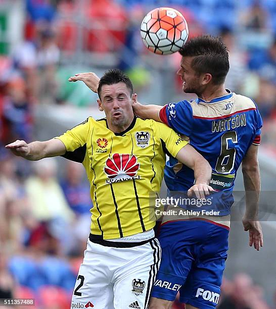 Emmanuel Muscat of the Phoenix contests the header against Cameron Watson of the Jets during the round 20 A-League match between the Newcastle Jets...