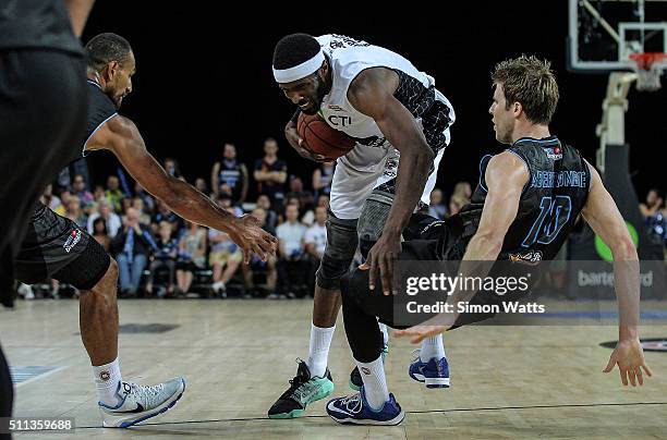 Hakim Warrick of Melbourne looks to drive through the defense of Tom Abercrombie of the Breakers during the NBL Semi Final match between the New...