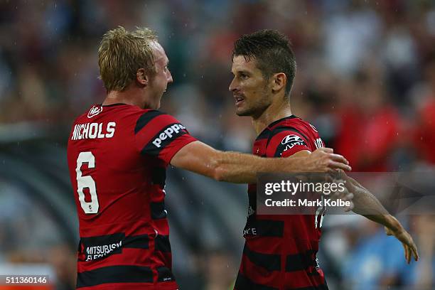 Mitch Nichols and Dario Vidosic of the Wanderers celebrate Dario Vidosic scoring a goal during the round 20 A-League match between Sydney FC and the...
