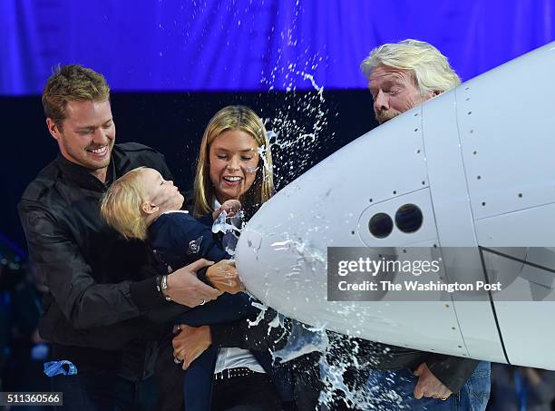 Virgin Galactic's Richard Branson alongside his son, Sam, daughter-in-law, Isabella and their child, Eva-Deia Branson christen the new SpaceShip Two...