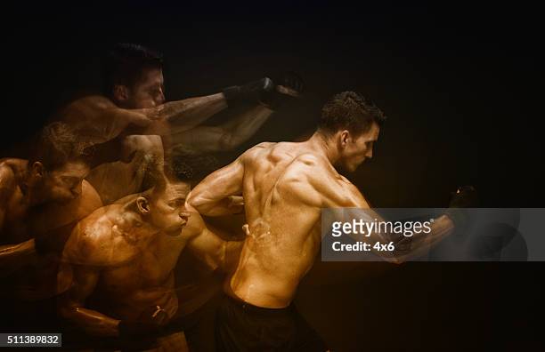multiple exposure - muscular man in combat pose - combat sport stock pictures, royalty-free photos & images