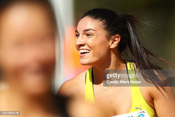 Michelle Jenneke of NSW celebrates after winning the Womens 100 Metre Hurdles during the Canberra Track Classic at the AIS Athletics track February...