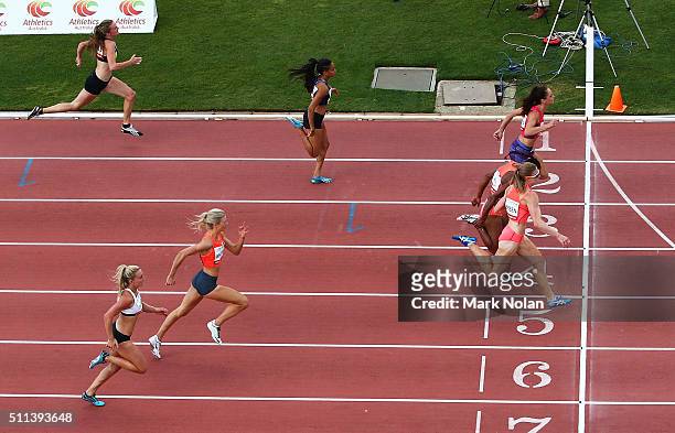 Ella Nelson of NSW, Toea Wisil of PNG and Melissa Breen of ACT cross the line together in the Womens 100 Metre Race during the Canberra Track Classic...