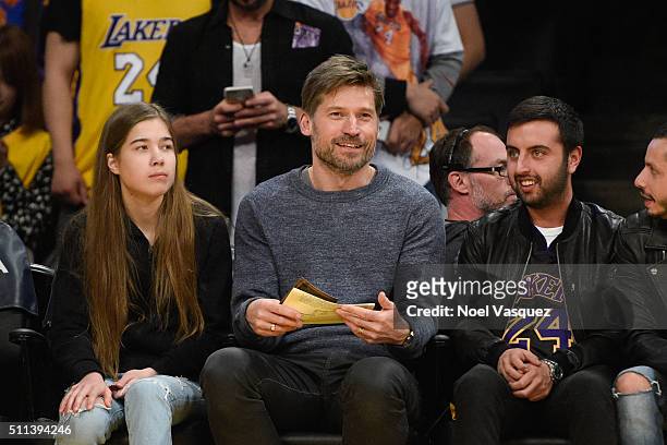 Filippa Coster-Waldau and Nikolaj Coster-Waldau attend a basketball game between the San Antonio Spurs and the Los Angeles Lakers at Staples Center...