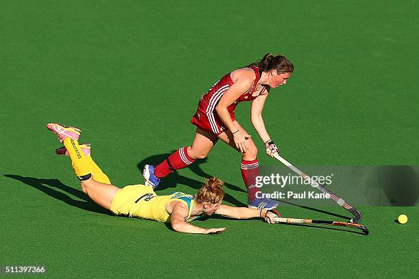 Georgia Nanscawen of Australia challenges Joie Leigh of Great Britain during the International Test match between the Australian Hockeyroos and Great...